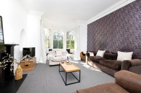 JOIVY Delightful 3-bed flat with parking